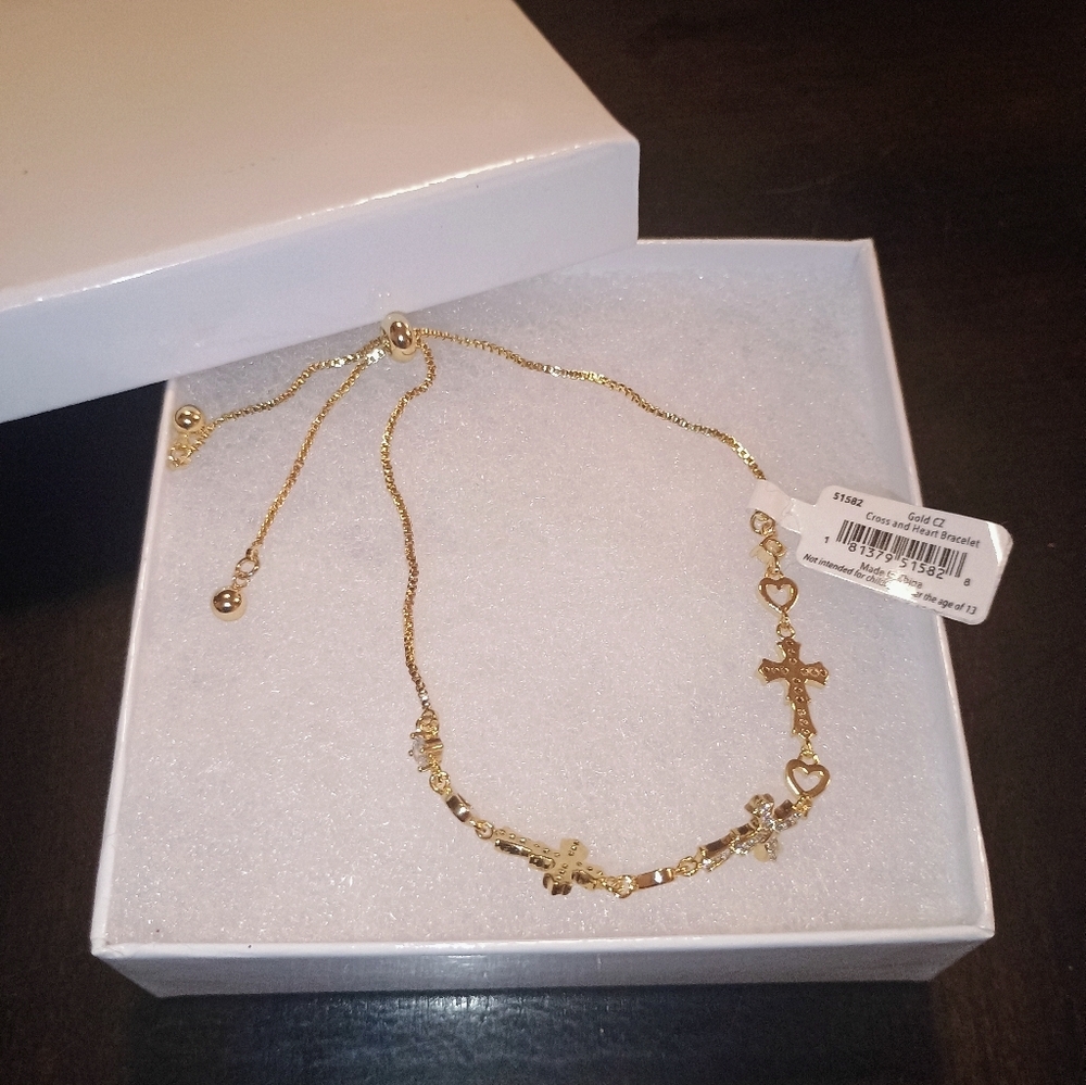 Heart and cross adjustable women's bracelet Gold cz . Brand new in box
